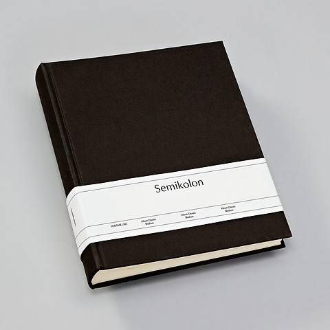 Album Medium, booklinen cover, 80pages, cream white mounting board, glassine paper, black